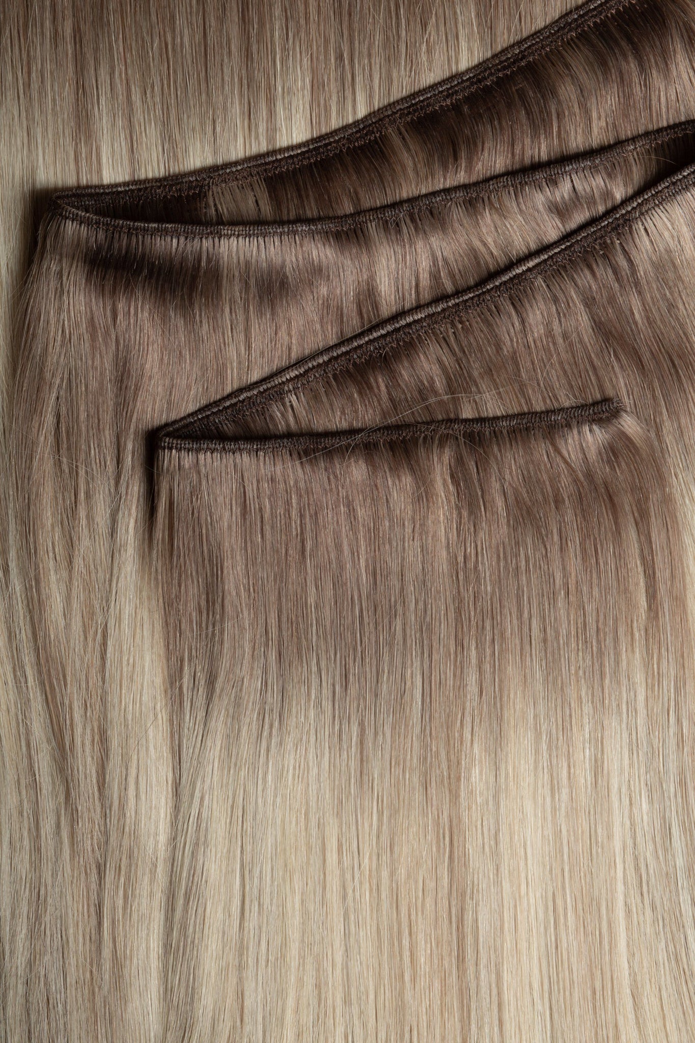 West Label Hair Extensions. Pure Russian remy Hair, Professional hair extensions. Clip-in. tale-in weft, sew-in, keratin tip. Best brand of hair extensions. Lasts 12 months, shiny hair, smooth hair, top hair extension brand. Balayage extensions, ombre 